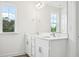 Elegant bathroom featuring a double sink vanity with ample counter space and modern fixtures at 420 Shelby Meadow Ln, Angier, NC 27501