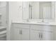 Bathroom featuring double sink vanity with ample counter space and storage at 420 Shelby Meadow Ln, Angier, NC 27501