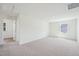 Spacious bonus room with soft carpeting, perfect for entertaining, relaxing, or hobbies at 420 Shelby Meadow Ln, Angier, NC 27501