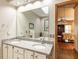 Bright bathroom with double sink vanity, large mirror, and relaxing soaking tub at 422 Old Scarborough Ln, Garner, NC 27529