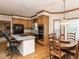Bright kitchen with a granite island, stainless appliances, and a cozy breakfast area at 422 Old Scarborough Ln, Garner, NC 27529