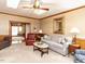 Spacious living room featuring neutral walls and plush carpeting for comfortable living at 422 Old Scarborough Ln, Garner, NC 27529