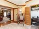 Versatile office space connects to living room with glass doors, offering ample work space at 422 Old Scarborough Ln, Garner, NC 27529