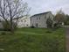 Scenic backyard with lush greenery and view of the home's exterior at 4610 Miller Dr, Durham, NC 27704