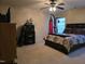 Spacious bedroom with a ceiling fan, natural light, and closet at 4610 Miller Dr, Durham, NC 27704