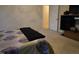 View of a bedroom featuring carpeted floor and a door at 4610 Miller Dr, Durham, NC 27704