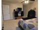 Bedroom with a ceiling fan, carpet, and media center at 4610 Miller Dr, Durham, NC 27704