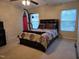 Spacious bedroom with a ceiling fan, windows and a punching bag at 4610 Miller Dr, Durham, NC 27704