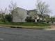 Charming two-story home featuring a well-manicured front yard with lush greenery at 4610 Miller Dr, Durham, NC 27704