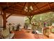 Wood-roofed gazebo with seating offers an inviting outdoor space for relaxation and entertaining at 4709 Knights Arm Dr, Durham, NC 27707