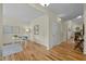 Bright living space with hardwood floors, neutral paint, and ample natural light at 4709 Knights Arm Dr, Durham, NC 27707