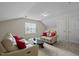 Upstairs living room featuring 2 sofas, plush carpet, and a bright window at 4709 Knights Arm Dr, Durham, NC 27707