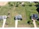 Overhead view of the home highlighting its large lot, fenced backyard, and surrounding neighborhood at 4905 Homestead Dr, Mebane, NC 27302