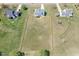 Aerial shot of the property showcasing its generous lot size and well-defined fenced backyard at 4905 Homestead Dr, Mebane, NC 27302