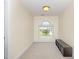 Bedroom features a window that overlooks a well-kept lawn at 4905 Homestead Dr, Mebane, NC 27302