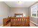 Bedroom features wood flooring, a full bed, dresser and natural light at 4905 Homestead Dr, Mebane, NC 27302