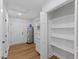 Bright laundry room boasts new flooring, water heater, closet and lots of storage at 508 N Charles St, Mebane, NC 27302