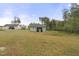 Spacious backyard with storage shed, providing a serene environment and ample space for entertainment at 52 Sagebrook Ct, Zebulon, NC 27597