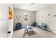 Bright, carpeted bedroom with a window and a cute playroom area for  at 52 Sagebrook Ct, Zebulon, NC 27597