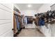 Walk-in closet with clothing racks and ample storage space for clothing and accessories at 52 Sagebrook Ct, Zebulon, NC 27597