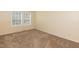 Bright bedroom with carpet floors and natural light streaming in through windows at 660 Our Way, Linden, NC 28356
