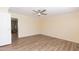 A cozy bedroom with a ceiling fan and modern flooring at 660 Our Way, Linden, NC 28356