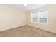 Spacious bedroom featuring carpet floors and dual windows at 660 Our Way, Linden, NC 28356