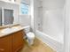 Bathroom with shower-tub combination, single vanity, and bright lighting at 7 Moonbeam Ct, Durham, NC 27712