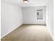 Bedroom with a window, neutral paint, and carpet flooring at 7 Moonbeam Ct, Durham, NC 27712