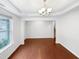 Formal dining room with hardwood floors, recessed lighting, and a large window for natural light at 7 Moonbeam Ct, Durham, NC 27712
