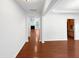 Spacious living room boasting hardwood floors, recessed lighting, and an open floor plan at 7 Moonbeam Ct, Durham, NC 27712