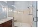 The bathroom includes a walk-in shower with a glass door, mosaic tile, and double shower heads at 7002 Old Trail Dr, Durham, NC 27712