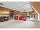 Large living room with coffered ceilings, wet bar, seating area, and billiard table at 7002 Old Trail Dr, Durham, NC 27712