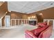 Spacious living room with wet bar, comfortable seating, and a cozy ambiance at 7002 Old Trail Dr, Durham, NC 27712