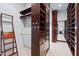 Spacious walk-in closet with custom shelving and ample storage space at 7002 Old Trail Dr, Durham, NC 27712