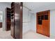 Walk-in closet with custom wooden organizers, shelves and drawer space at 7002 Old Trail Dr, Durham, NC 27712