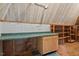 Functional workshop space with ample storage, cabinets, and a pegboard for tools at 7002 Old Trail Dr, Durham, NC 27712