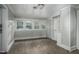 Bright room with vinyl flooring, natural light, and neutral paint, offers flexibility for any decor at 703 Cokey Rd, Rocky Mount, NC 27801