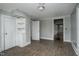 Versatile room with vinyl flooring, built-in shelves, and neutral paint, perfect for any purpose at 703 Cokey Rd, Rocky Mount, NC 27801