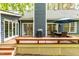 Backyard deck with a grill and outdoor furniture at 706 Kensington Dr, Chapel Hill, NC 27514