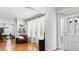 Inviting entryway leading to living room, featuring hardwood floors and natural light at 706 Kensington Dr, Chapel Hill, NC 27514