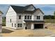 Two-story home featuring an attached two-car garage and unfinished yard at 709 Compeer Way # 32, Rolesville, NC 27571