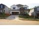 Two-story home featuring a spacious two-car garage, brick accents, and newly installed grass at 709 Deschutes Dr, Garner, NC 27529
