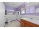 Bathroom featuring tile floors, a toilet and wood vanity with sink at 711 Melanie St, Durham, NC 27704