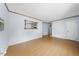 Spacious living room with wood flooring, offering a blank canvas for personalization at 711 Melanie St, Durham, NC 27704