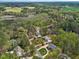 High angle of a home in a leafy, upscale neighborhood near a river and ponds at 7336 Barham Hollow Dr, Wake Forest, NC 27587