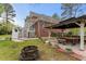 Landscaped backyard with a gazebo and seating area, excellent for entertaining guests at 7336 Barham Hollow Dr, Wake Forest, NC 27587