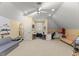 Large bonus room featuring a sewing area, a couch, and natural light from a window at 7336 Barham Hollow Dr, Wake Forest, NC 27587