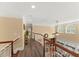 Foyer boasts an open design with hardwood floors and balcony overlooking the living room at 7336 Barham Hollow Dr, Wake Forest, NC 27587