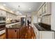 Entertain in this open concept kitchen with a center island, stainless steel appliances, and bar-top seating at 7336 Barham Hollow Dr, Wake Forest, NC 27587